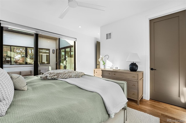 bedroom with visible vents, a ceiling fan, access to outside, wood finished floors, and recessed lighting