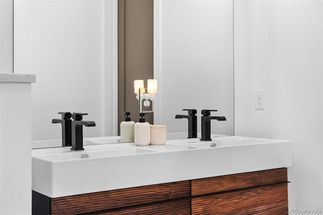 bathroom with double vanity and a sink