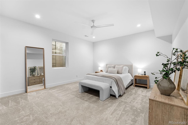 bedroom with light carpet, recessed lighting, baseboards, and ceiling fan