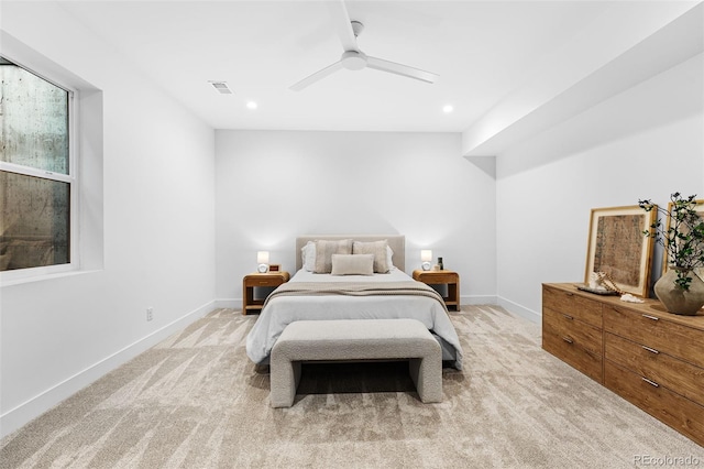 bedroom featuring a ceiling fan, visible vents, baseboards, recessed lighting, and light colored carpet