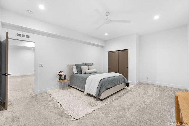 bedroom with visible vents, light carpet, a ceiling fan, recessed lighting, and baseboards