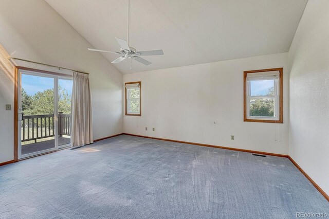 unfurnished room with high vaulted ceiling, ceiling fan, and a wealth of natural light