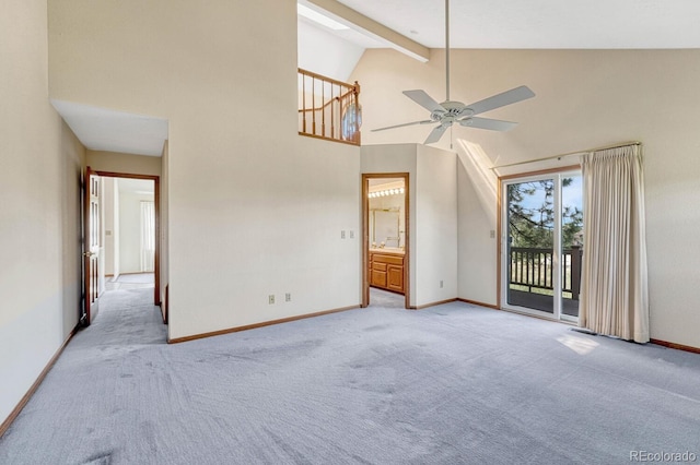 carpeted spare room with high vaulted ceiling, beam ceiling, and ceiling fan