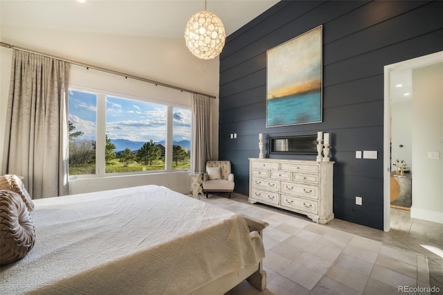 3585 Meadow Run Cir, Colorado Springs, CO 80908 - bedroom featuring high vaulted ceiling, wood walls, a chandelier, and light tile patterned floors