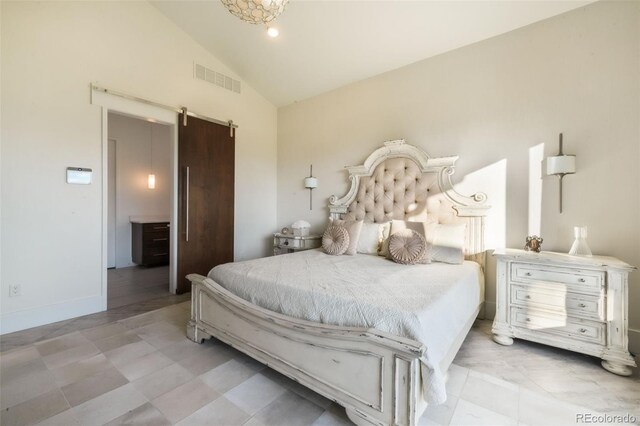 3585 Meadow Run Cir, Colorado Springs, CO 80908 - bedroom with a barn door, vaulted ceiling, and baseboards