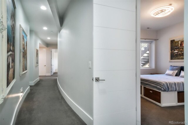 3585 Meadow Run Cir, Colorado Springs, CO 80908 - hall with dark colored carpet, baseboards, and recessed lighting