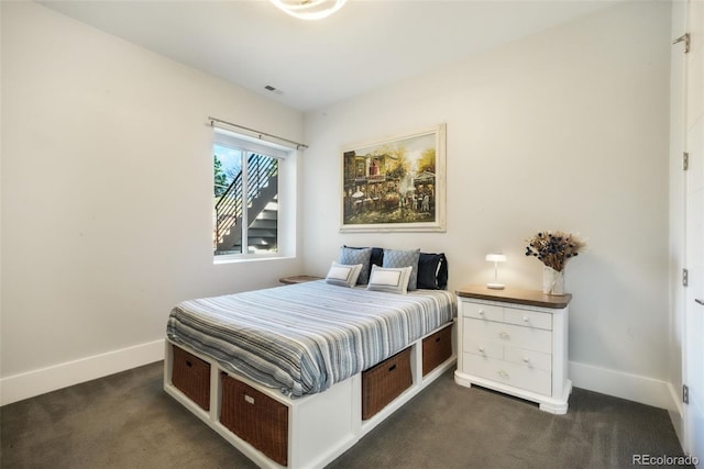 3585 Meadow Run Cir, Colorado Springs, CO 80908 - bedroom featuring dark carpet and baseboards
