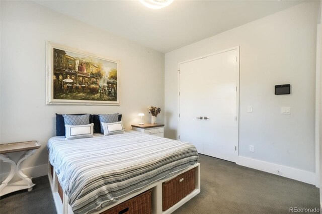 3585 Meadow Run Cir, Colorado Springs, CO 80908 - bedroom featuring dark carpet and baseboards