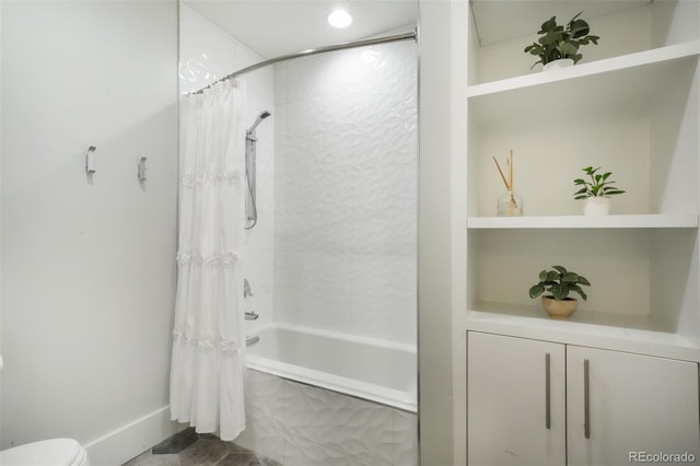 3585 Meadow Run Cir, Colorado Springs, CO 80908 - bathroom with tiled shower / bath, toilet, and baseboards