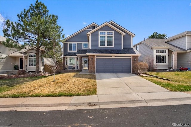 craftsman-style house featuring an attached garage, concrete driveway, a front yard, and brick siding