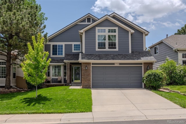 17018 Carr Ave, Parker, CO 80134 - view of front of house with brick siding, a garage, concrete driveway, a front yard, and a shingled roof