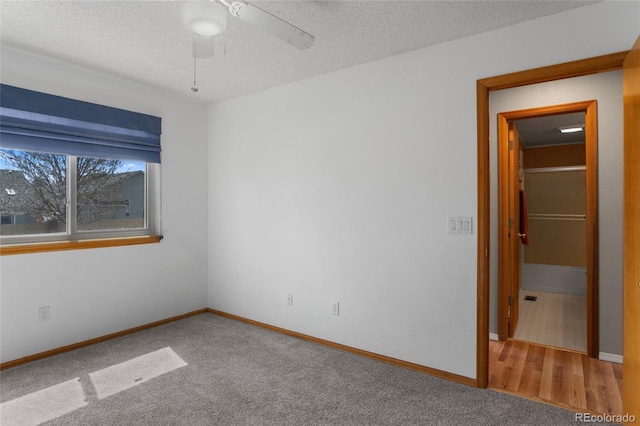 17018 Carr Ave, Parker, CO 80134 - carpeted empty room with a textured ceiling, baseboards, and ceiling fan