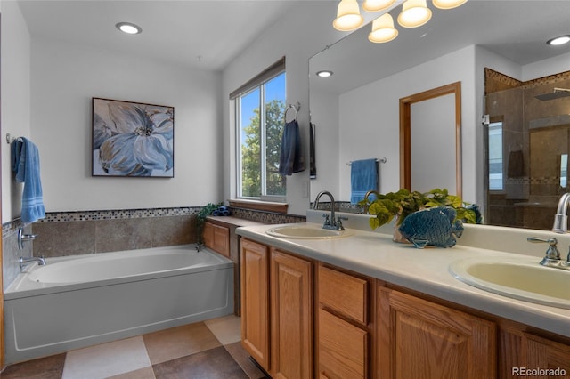 17018 Carr Ave, Parker, CO 80134 - bathroom with a garden tub, a shower stall, and double vanity