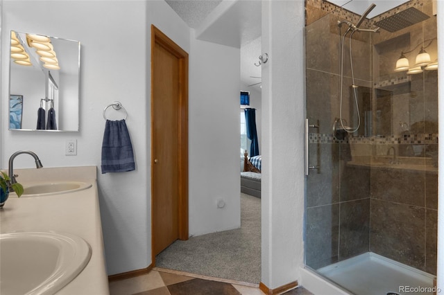 17018 Carr Ave, Parker, CO 80134 - ensuite bathroom with a shower stall, double vanity, and baseboards