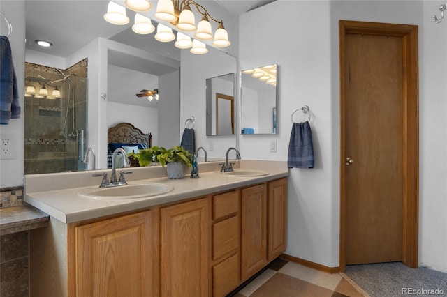 17018 Carr Ave, Parker, CO 80134 - full bath with double vanity, a tile shower, and ensuite bathroom