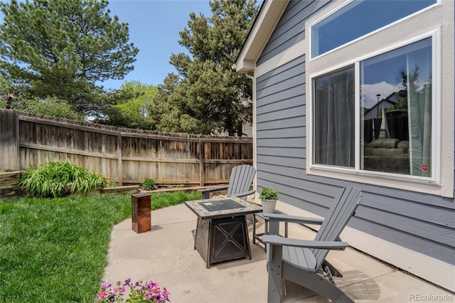 17018 Carr Ave, Parker, CO 80134 - view of patio / terrace with a fire pit