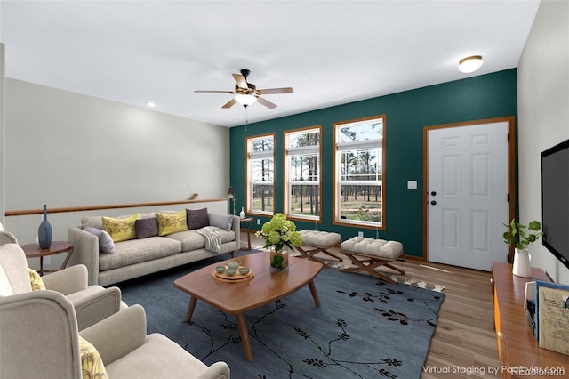 12730 Porcupine Ln, Colorado Springs, CO 80908 - living area with a ceiling fan and wood finished floors