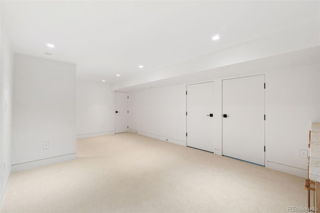 interior space with recessed lighting and light carpet