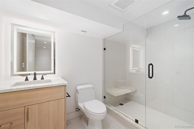 full bathroom with vanity, toilet, visible vents, and a stall shower