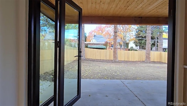 entryway with wood ceiling