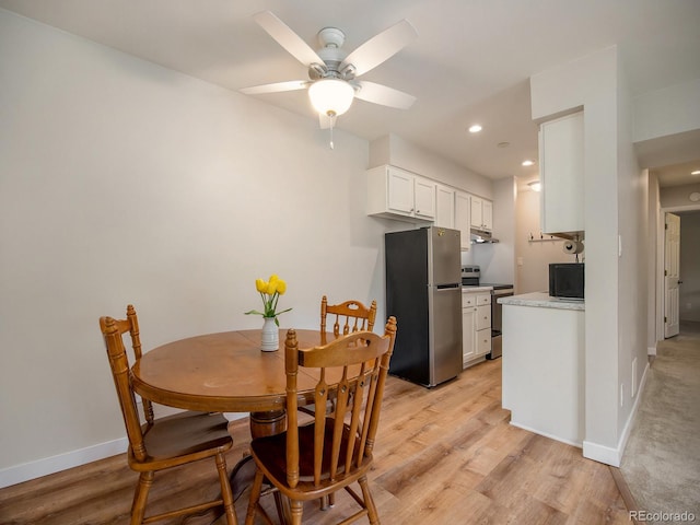 309 E Highline Cir Unit 104, Centennial, CO 80122 - dining space with ceiling fan, light wood finished floors, and recessed lighting