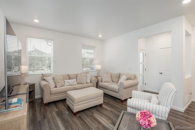 3365 N Coolidge Way, Aurora, CO 80019 - living area with dark wood-style floors, recessed lighting, and baseboards