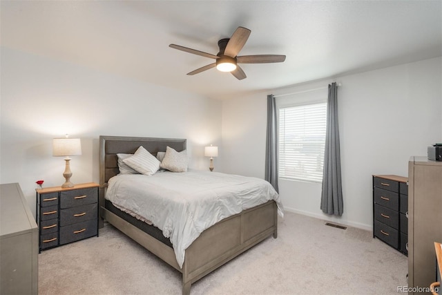 3365 N Coolidge Way, Aurora, CO 80019 - bedroom featuring light colored carpet, ceiling fan, and baseboards