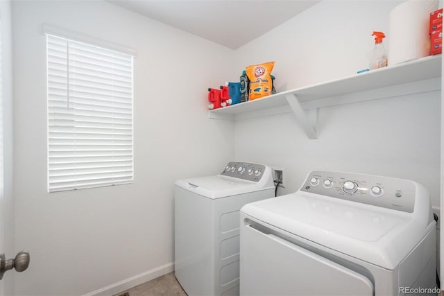 3365 N Coolidge Way, Aurora, CO 80019 - laundry area with washer and dryer and baseboards