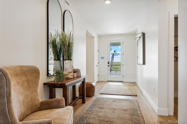 entrance foyer with light hardwood / wood-style floors