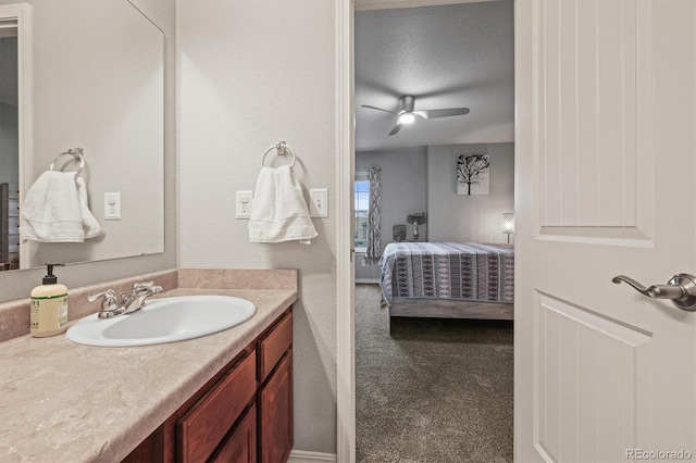 3677 Reindeer Cir, Colorado Springs, CO 80922 - ensuite bathroom with vanity and ceiling fan