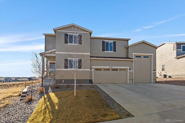 view of front of house with concrete driveway