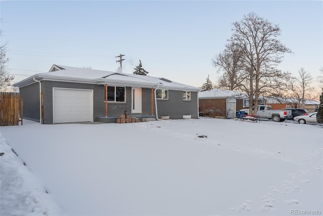 single story home featuring a garage