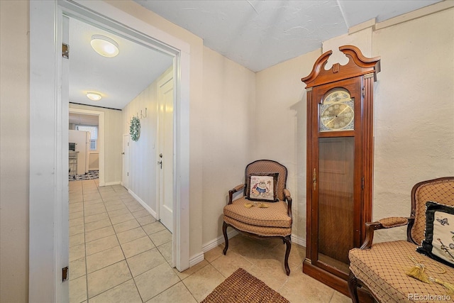 hallway with light tile patterned flooring