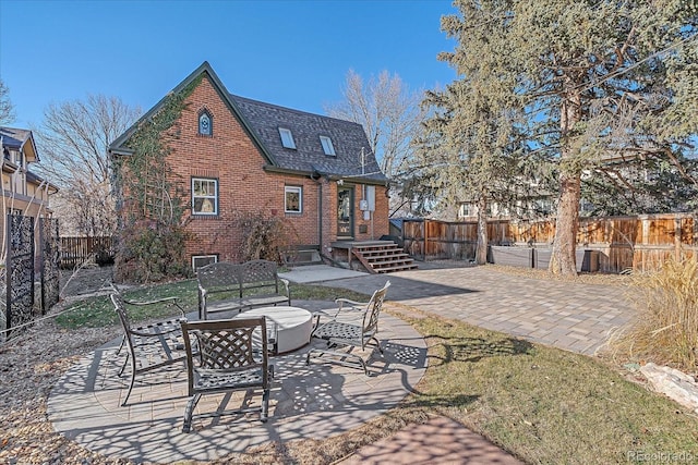 rear view of property with a patio area