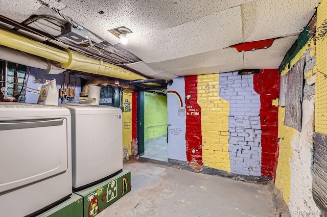 unfinished basement featuring separate washer and dryer