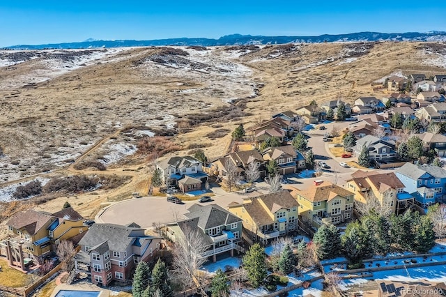 birds eye view of property with a mountain view and a residential view