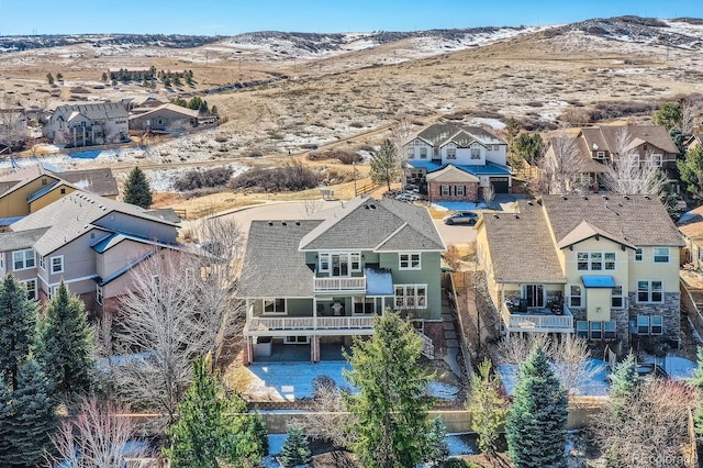 drone / aerial view with a mountain view and a residential view