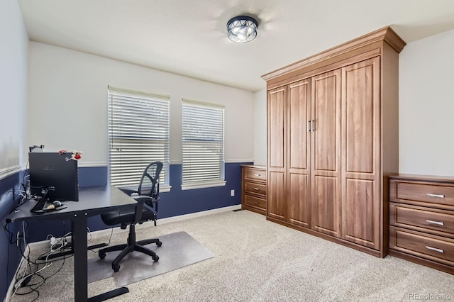 home office with carpet and baseboards