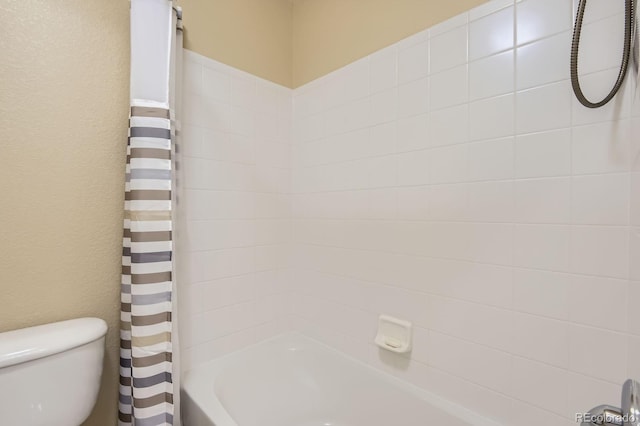 full bathroom with toilet and shower / tub combo