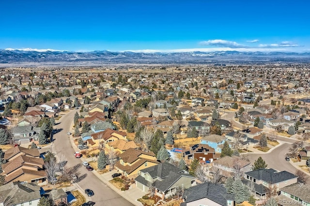 aerial view featuring a mountain view and a residential view