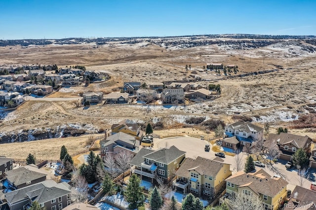 birds eye view of property with a residential view