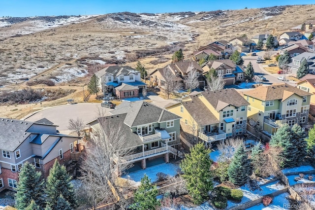 birds eye view of property featuring a mountain view and a residential view