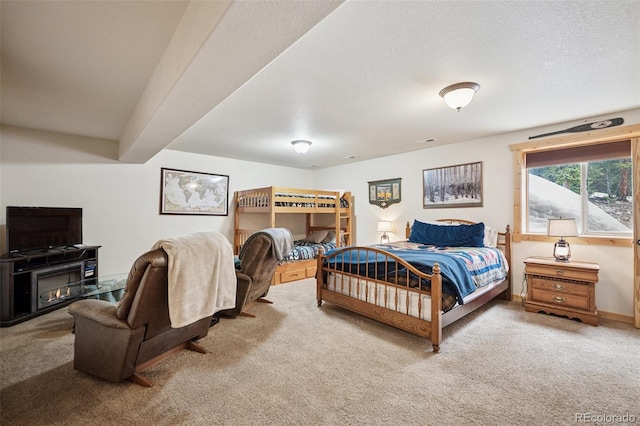 585 Miners Way, Fairplay, CO 80440 - carpeted bedroom with a glass covered fireplace