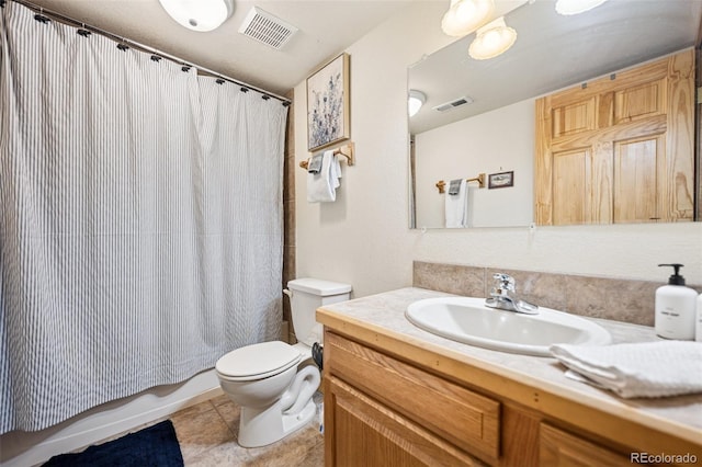 585 Miners Way, Fairplay, CO 80440 - bathroom featuring toilet, vanity, shower / bath combination with curtain, and tile patterned floors