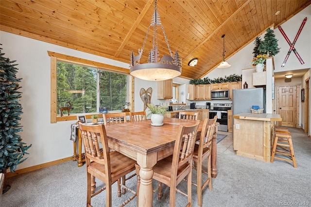 585 Miners Way, Fairplay, CO 80440 - dining space featuring wooden ceiling, light colored carpet, baseboards, and high vaulted ceiling