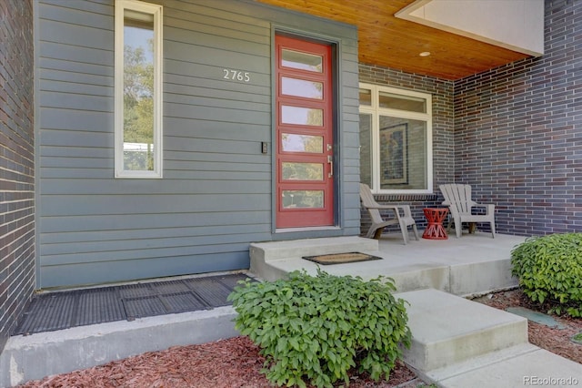 entrance to property with a porch