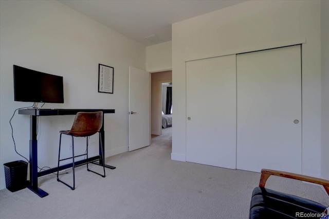 home office with light colored carpet