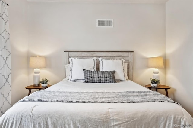 bedroom with visible vents