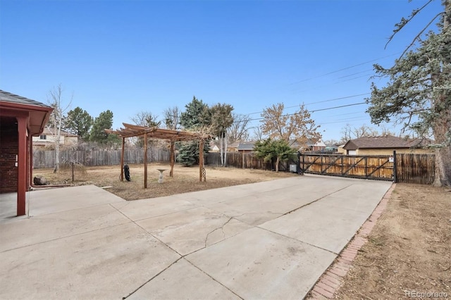 view of patio featuring a fenced backyard and a pergola