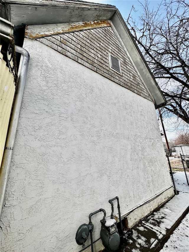 exterior space with stucco siding